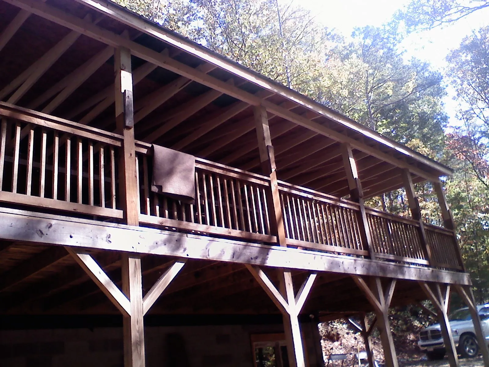 Timber framing under a new elevated porch and deck — Roof Leak Repair in Vancouver by Roofing Brothers